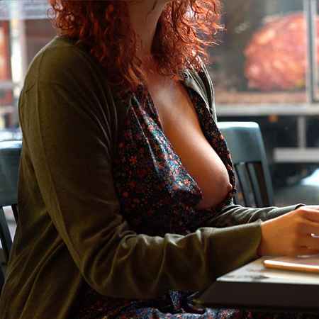 A busty redhead in 'Seilschaften' by Frivolous Dress Order